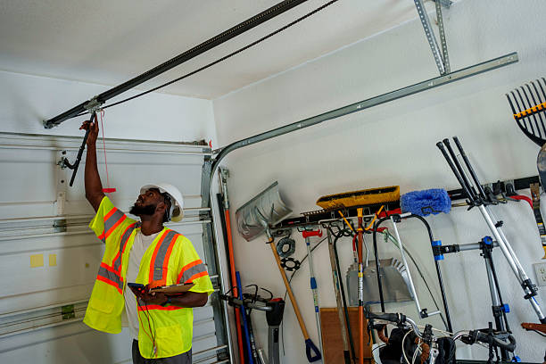 Professional Garage Door Maintenance technician working in North Lakeville, MA
